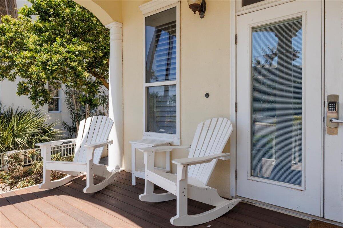 3581 Waverly Circle Destin, FL 32541 - Photo 32 of 33 a view of living room filled with furniture and wooden floor