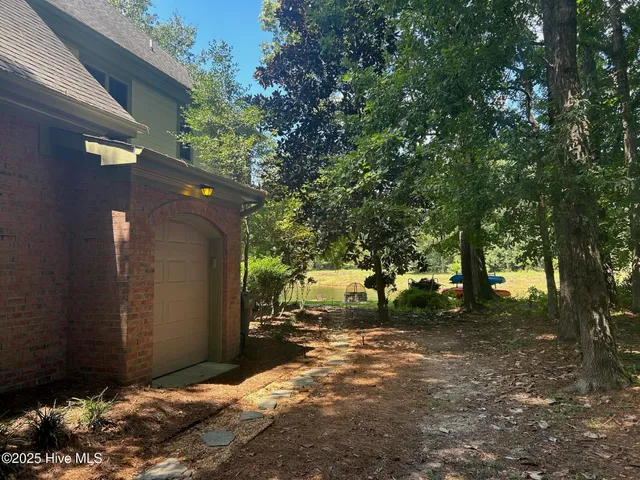 $520,000 | 214 Legacy Woods Drive, Wallace, NC 28466