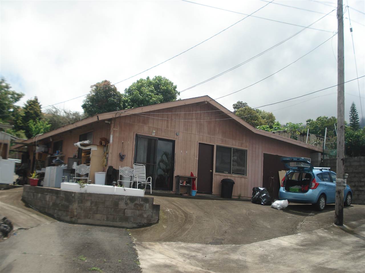 70 Alae Road Kula, HI 96790 - Photo 17 of 24 a view of a house with backyard and sitting area