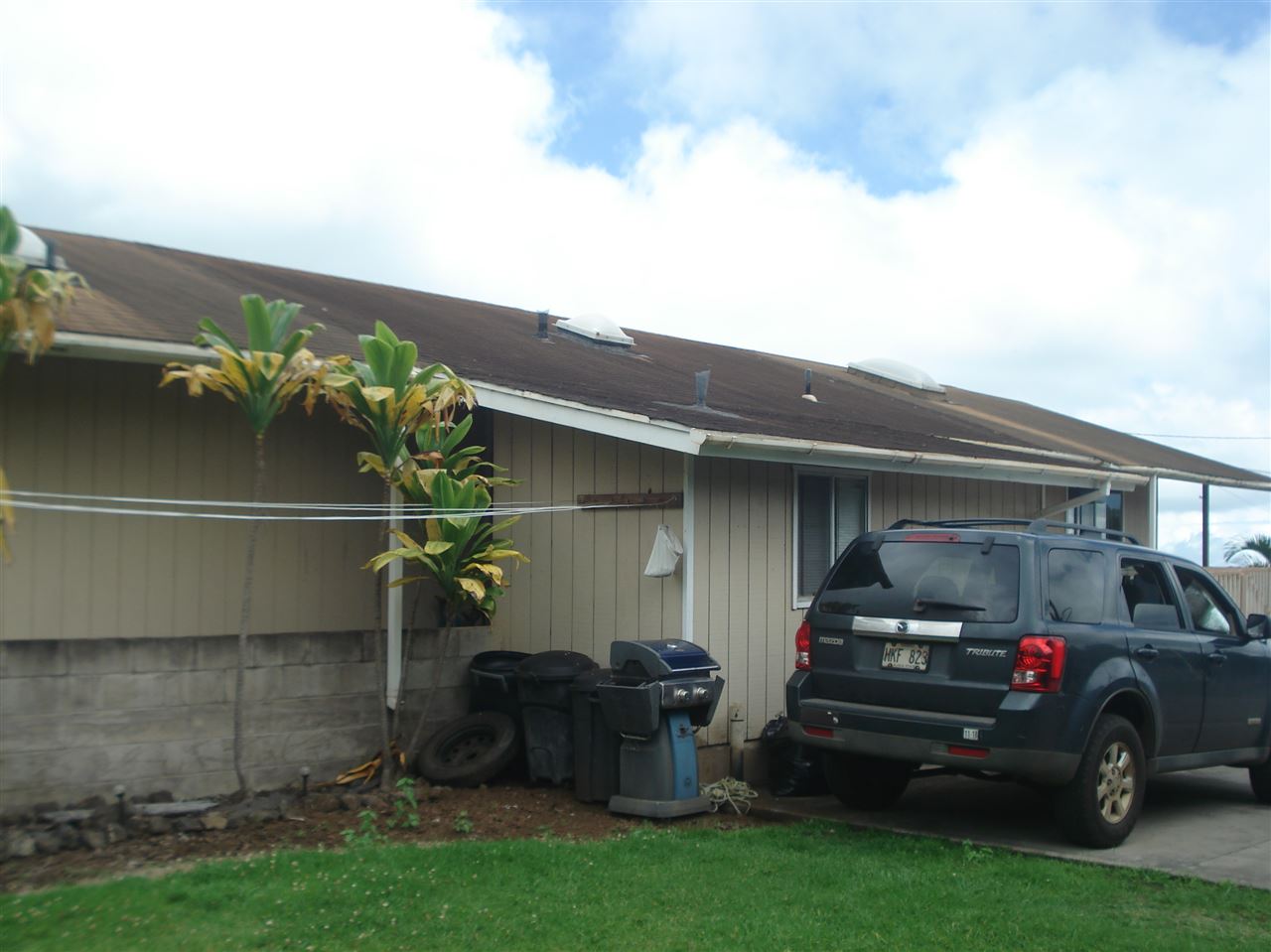 70 Alae Road Kula, HI 96790 - Photo 5 of 24 a car parked in front of a house