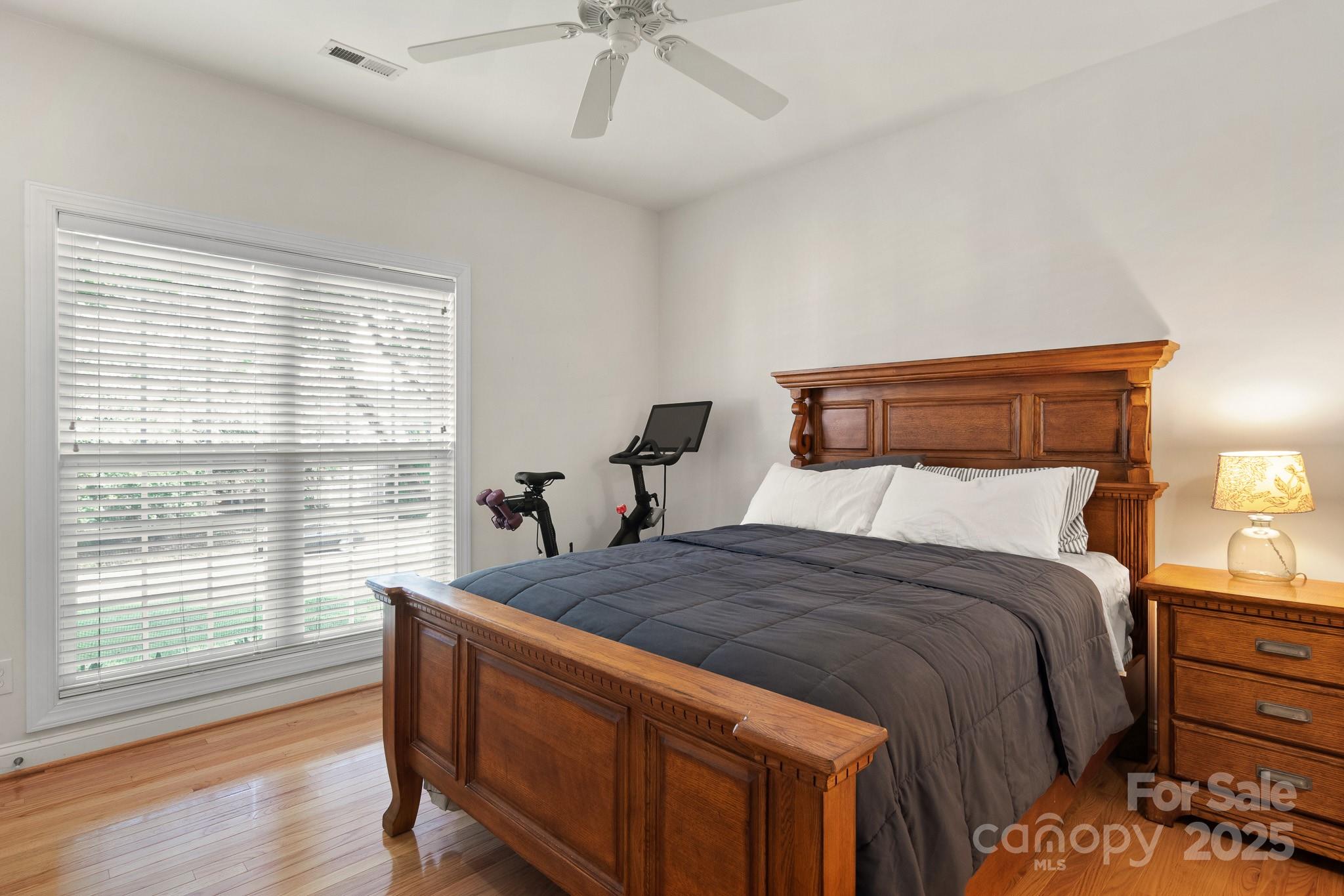 191 Melbourne Drive Fort Mill, SC 29708 - Photo 14 of 35 a bed sitting in a bedroom next to a window