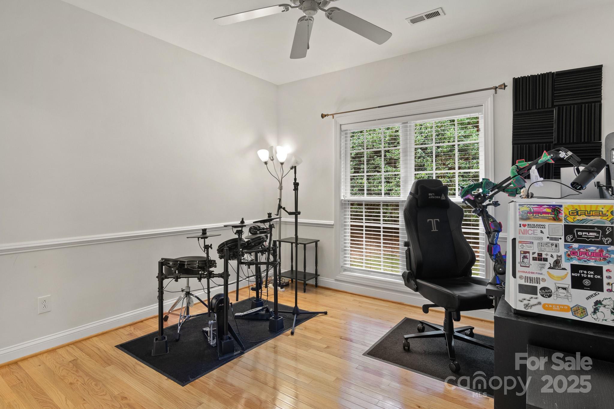 191 Melbourne Drive Fort Mill, SC 29708 - Photo 15 of 35 a view of a livingroom with furniture window and a ceiling fan
