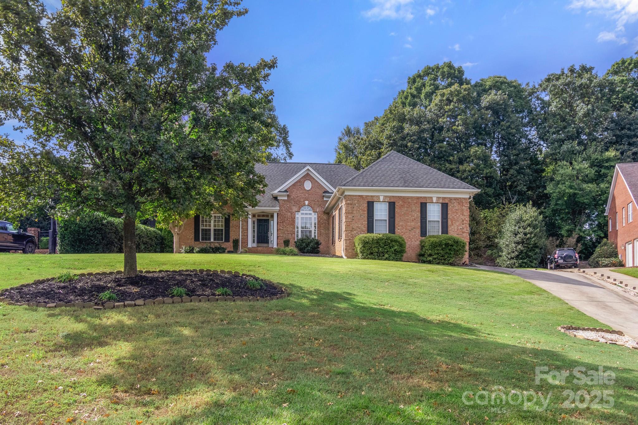 191 Melbourne Drive Fort Mill, SC 29708 - Photo 2 of 35 a front view of a house with a yard