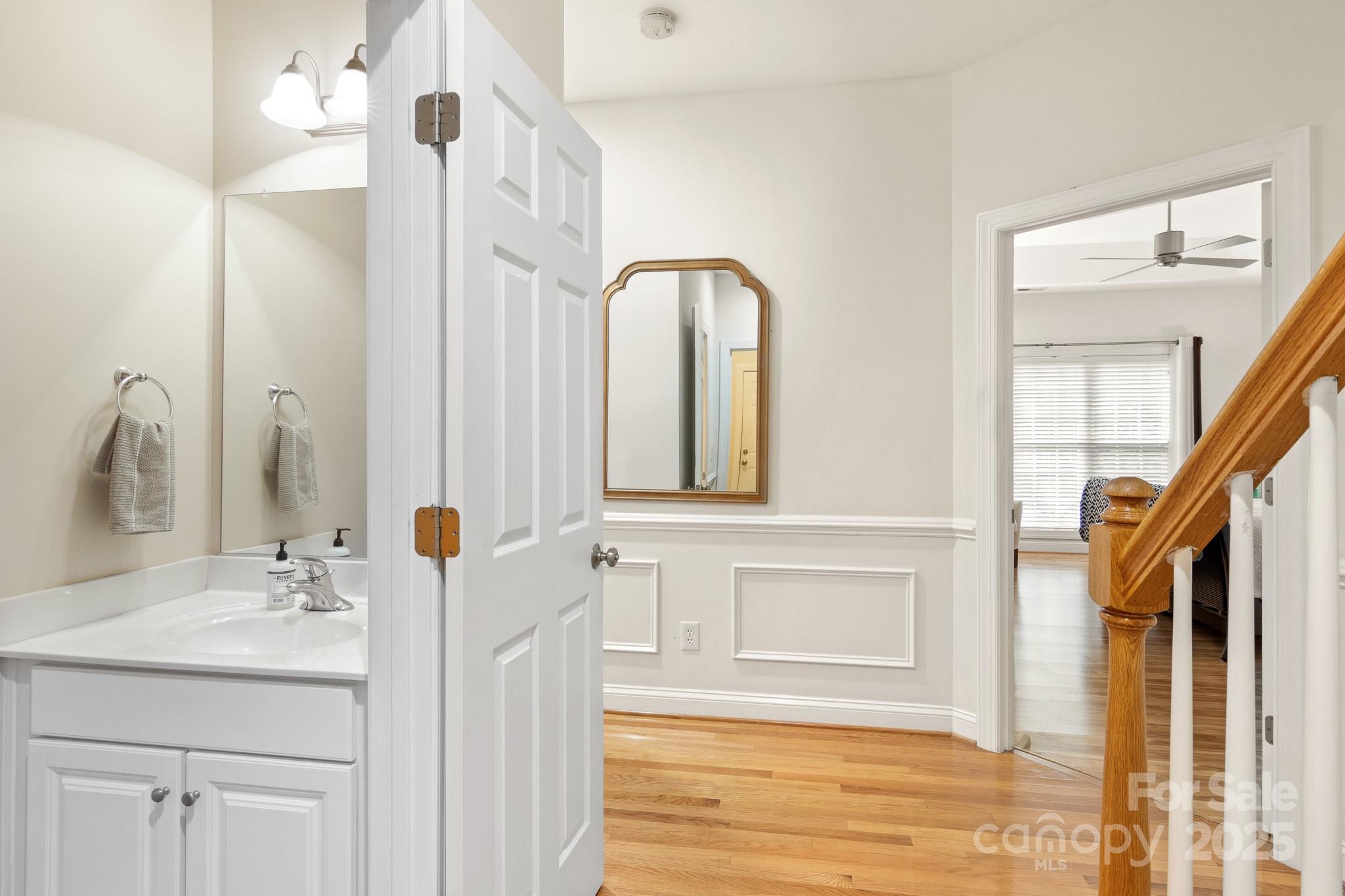 191 Melbourne Drive Fort Mill, SC 29708 - Photo 24 of 35 a bathroom with a sink and a mirror