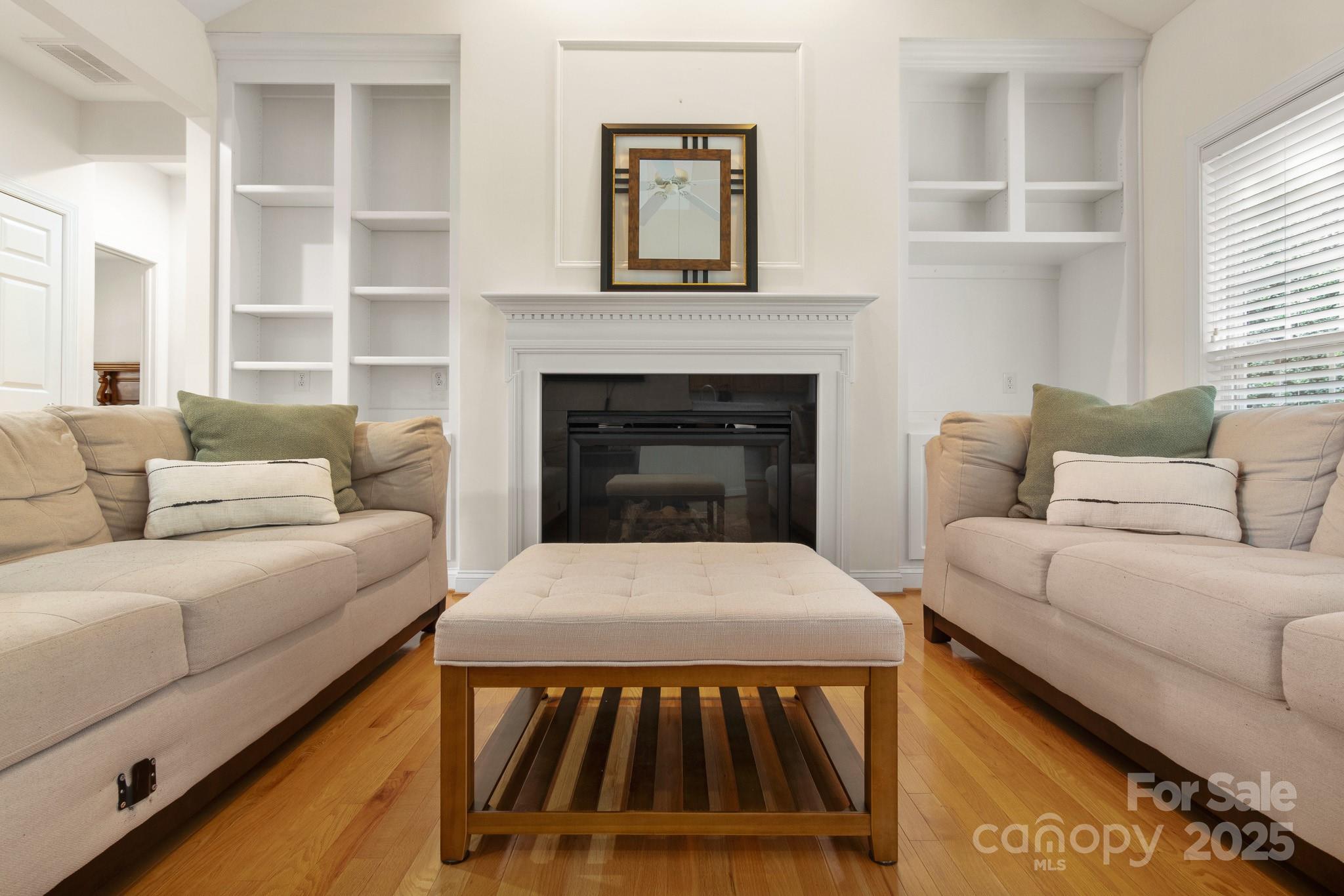 191 Melbourne Drive Fort Mill, SC 29708 - Photo 28 of 35 a living room with a couch and a fireplace