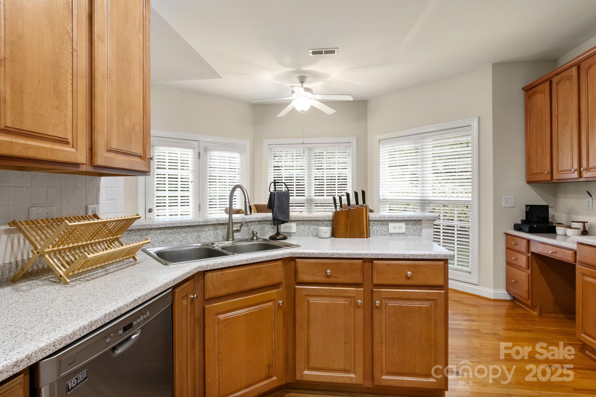 191 Melbourne Drive Fort Mill, SC 29708 - Photo 33 of 35 a kitchen with a sink and cabinets