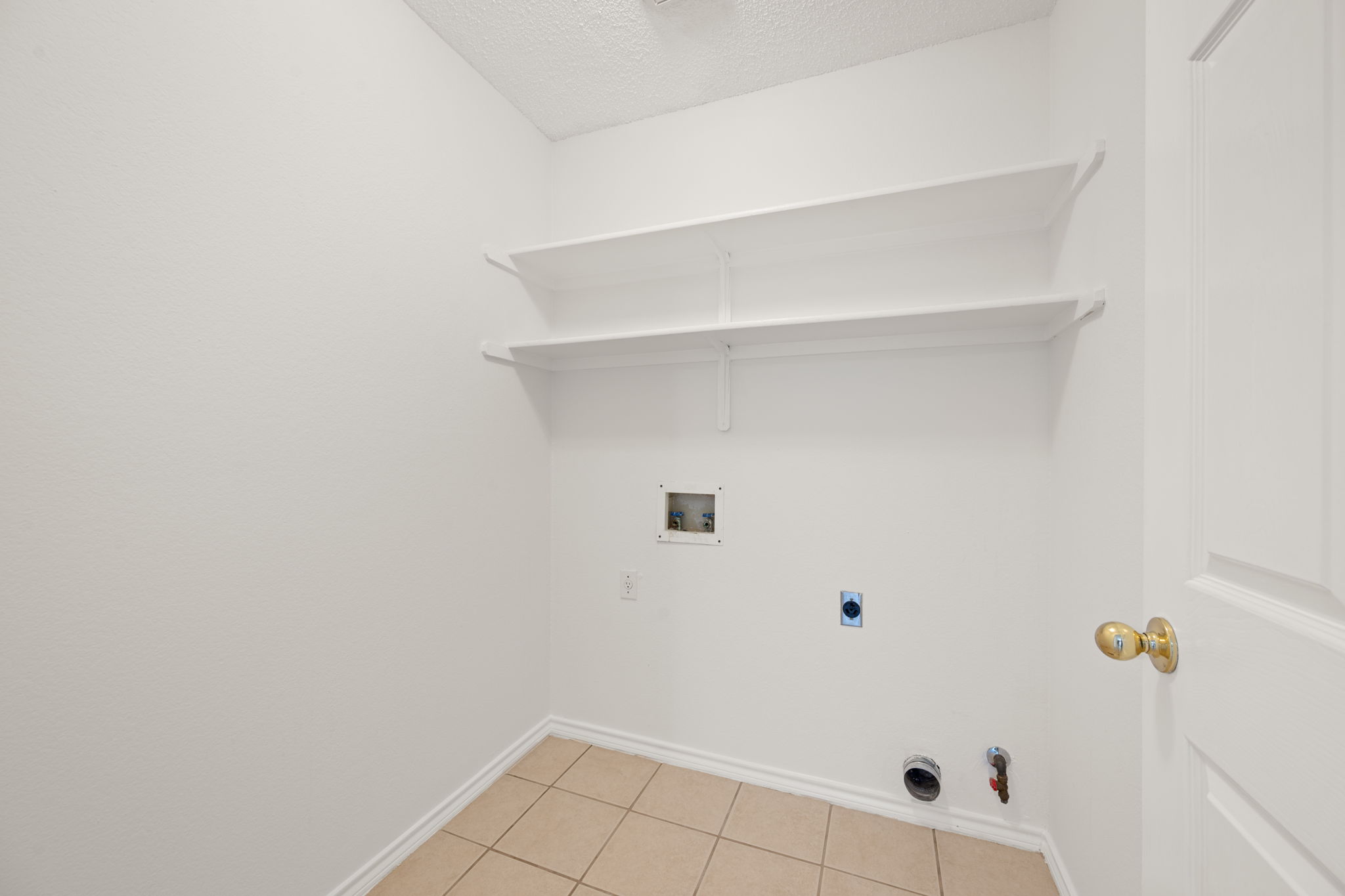 707 Ridge View Drive Leander, TX 78641 - Photo 38 of 40 a view of an empty walk in closet
