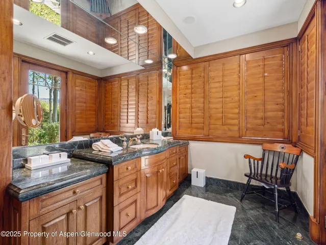 a bed room with a bed and a table