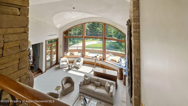 a kitchen with stainless steel appliances granite countertop a stove a sink and dishwasher cabinets with wooden floor