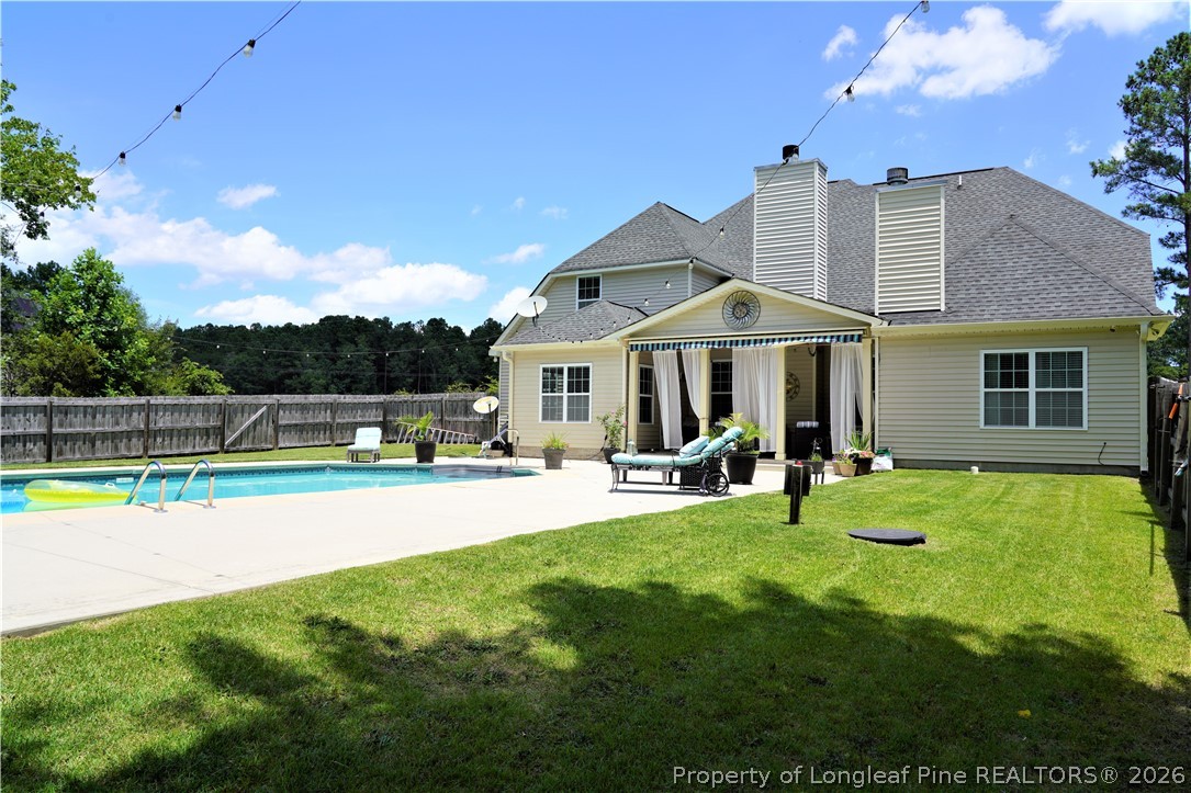 930 Old Vander Road Fayetteville, NC 28312 - Photo 38 of 45 a view of a house with pool and chairs