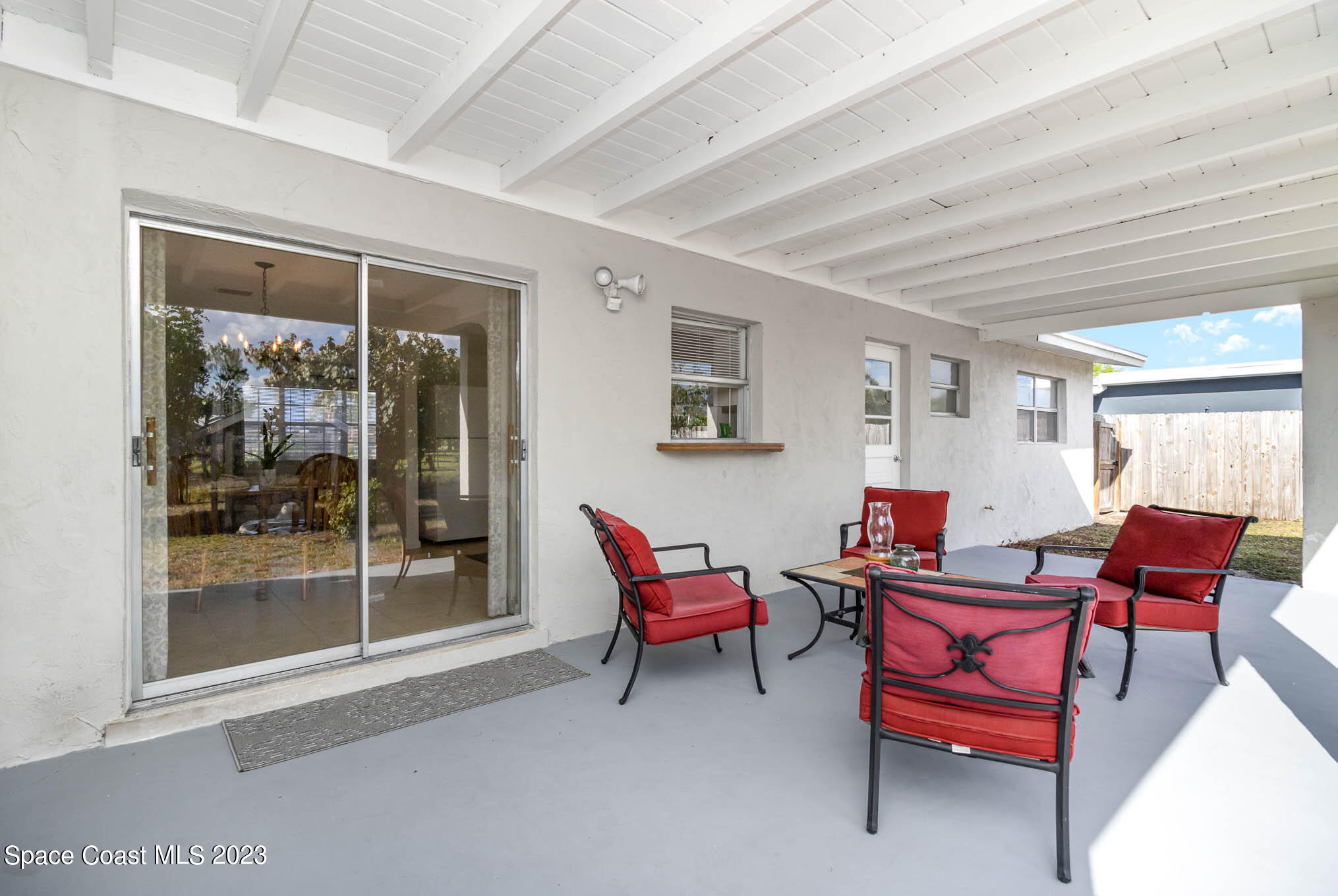 2095 Montgomery Road Melbourne, FL 32935 - Photo 2 of 25 a room with furniture and windows