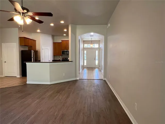 a view of a kitchen from the hallway