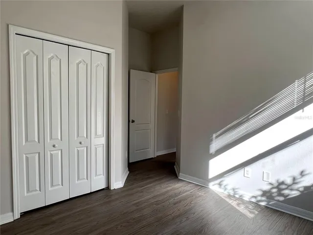 a view of a livingroom with wooden floor