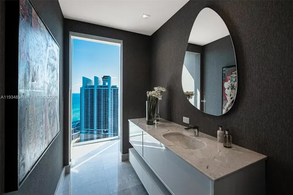 a spacious bedroom with two beds and a couch