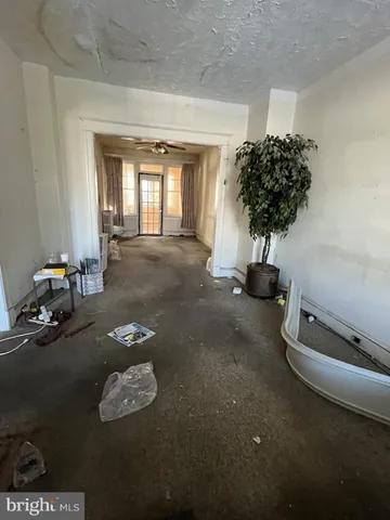 a view of a livingroom with furniture and window