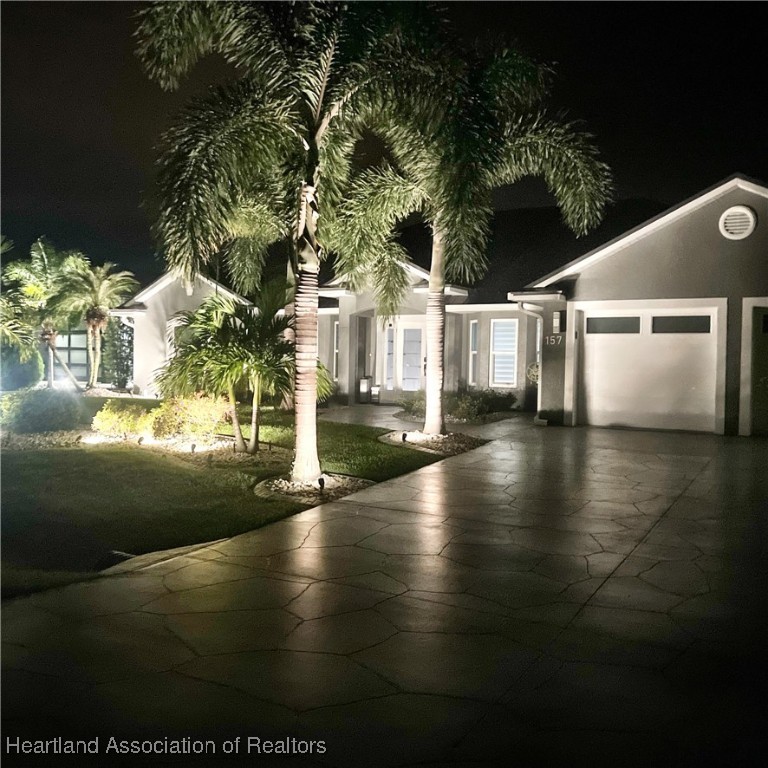 157 Loquat Road Northeast Lake Placid, FL 33852 - Photo 26 of 46 Low voltage Landscaping lighting.