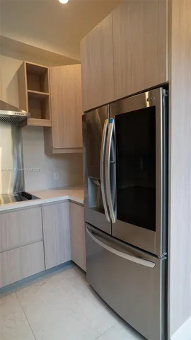 a utility room with cabinets