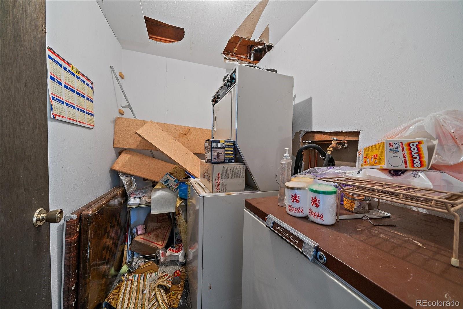 118 Neish Street Bailey, CO 80421 - Photo 15 of 27 a utility room with dryer and washer