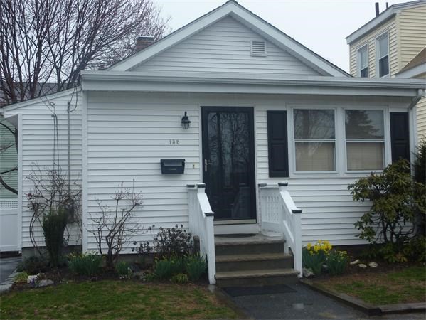 133 Hardy Pond Road Waltham, MA 02451 - Photo 22 of 30 a front view of a house with garden