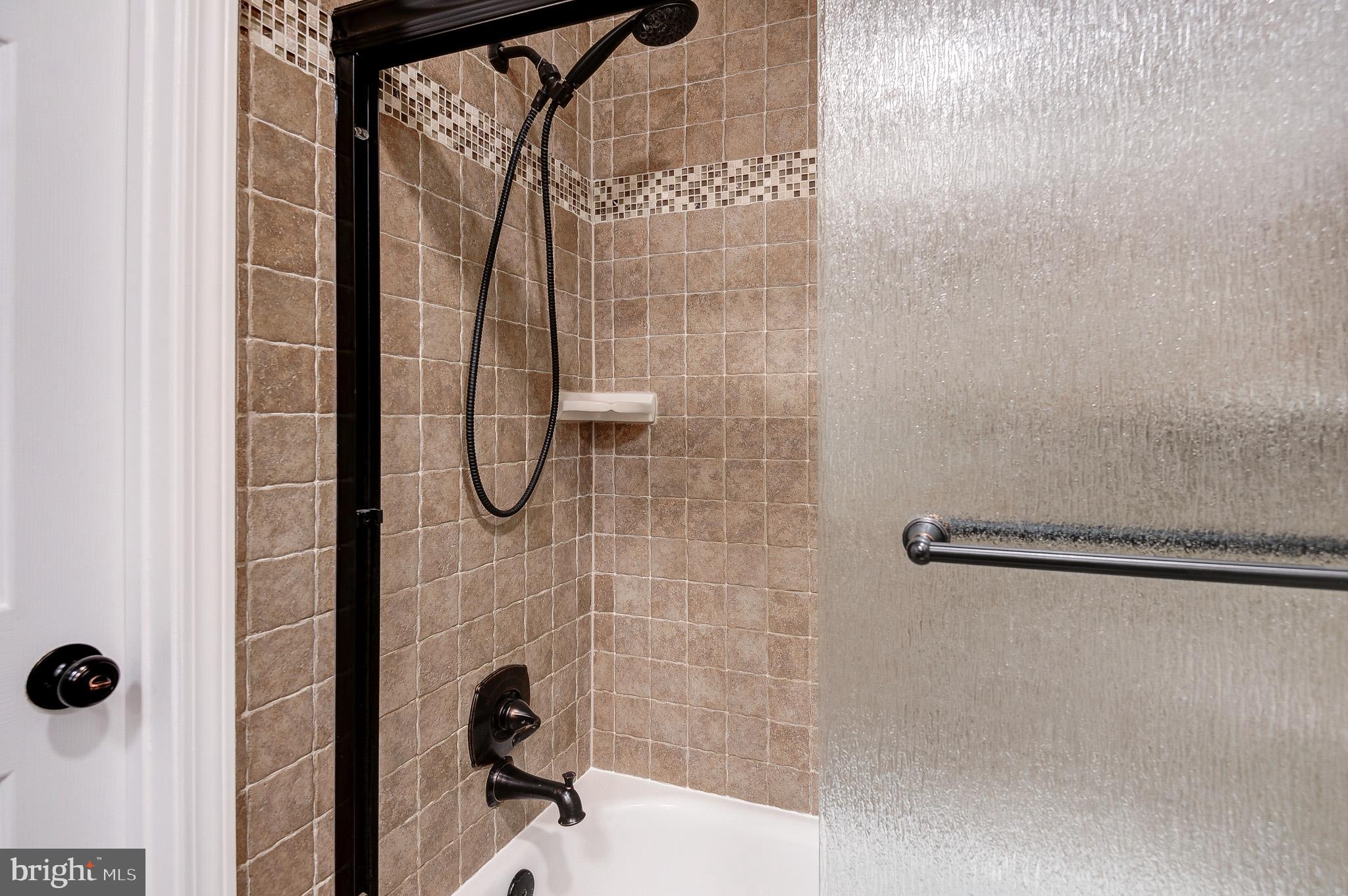 10116 Evans Ford Road Manassas, VA 20111 - Photo 26 of 63 a bathroom with a shower