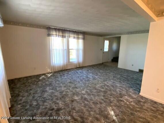 1810 South Dewitt Road St. Johns, MI 48879 - Photo 7 of 64 Living Room 2