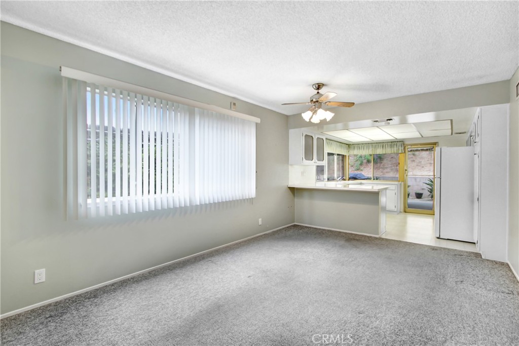 23848 Sunset Crossing Road Diamond Bar, CA 91765 - Photo 11 of 28 a view of an empty room with window and cabinet