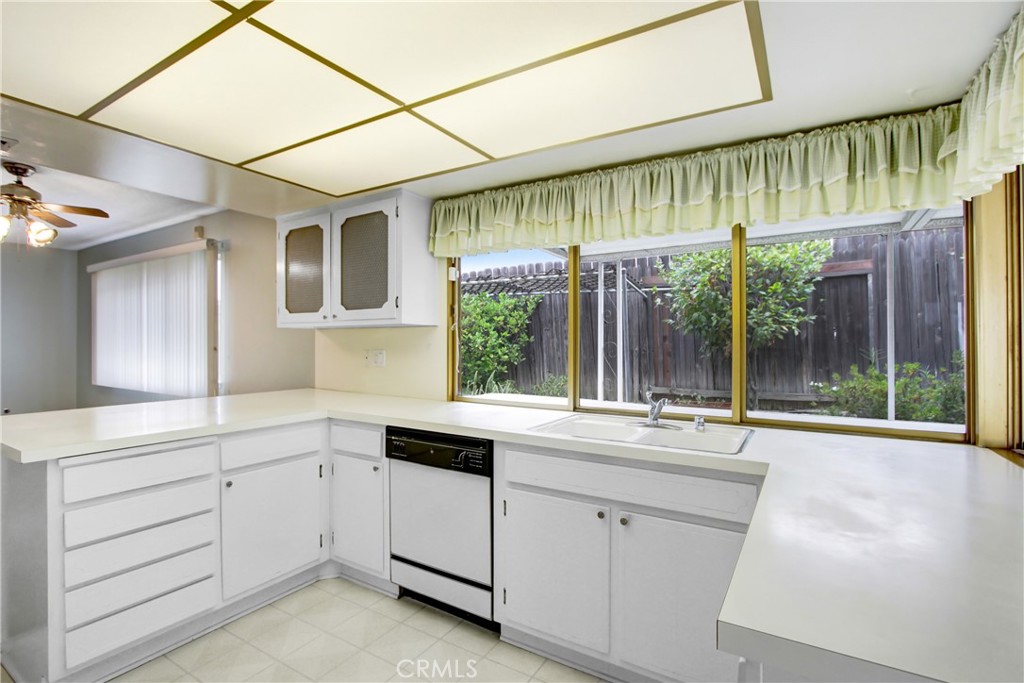 23848 Sunset Crossing Road Diamond Bar, CA 91765 - Photo 14 of 28 a kitchen with a sink and large window