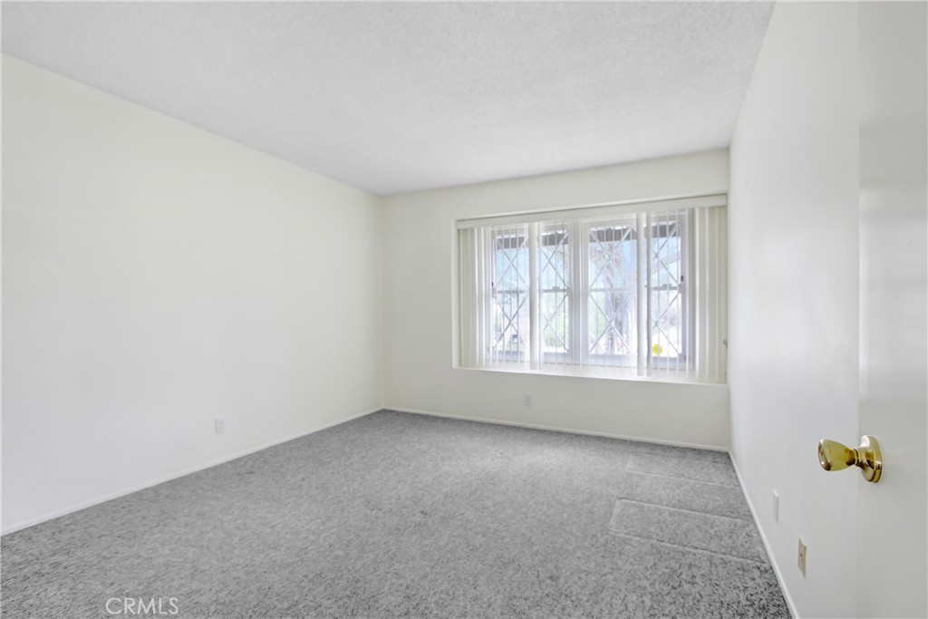 23848 Sunset Crossing Road Diamond Bar, CA 91765 - Photo 21 of 28 an empty room with a window