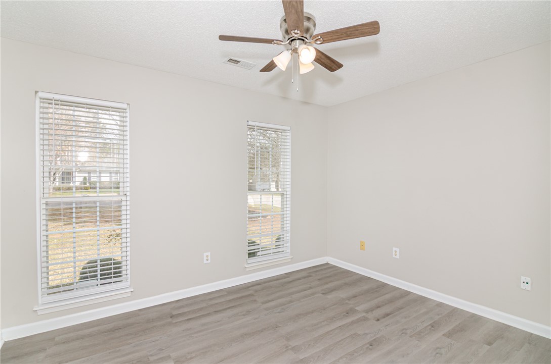 102 Hawk Ridge Drive Anderson, SC 29621 - Photo 7 of 38 This airy room features durable flooring and ample natural light, ideal for a tranquil retreat.