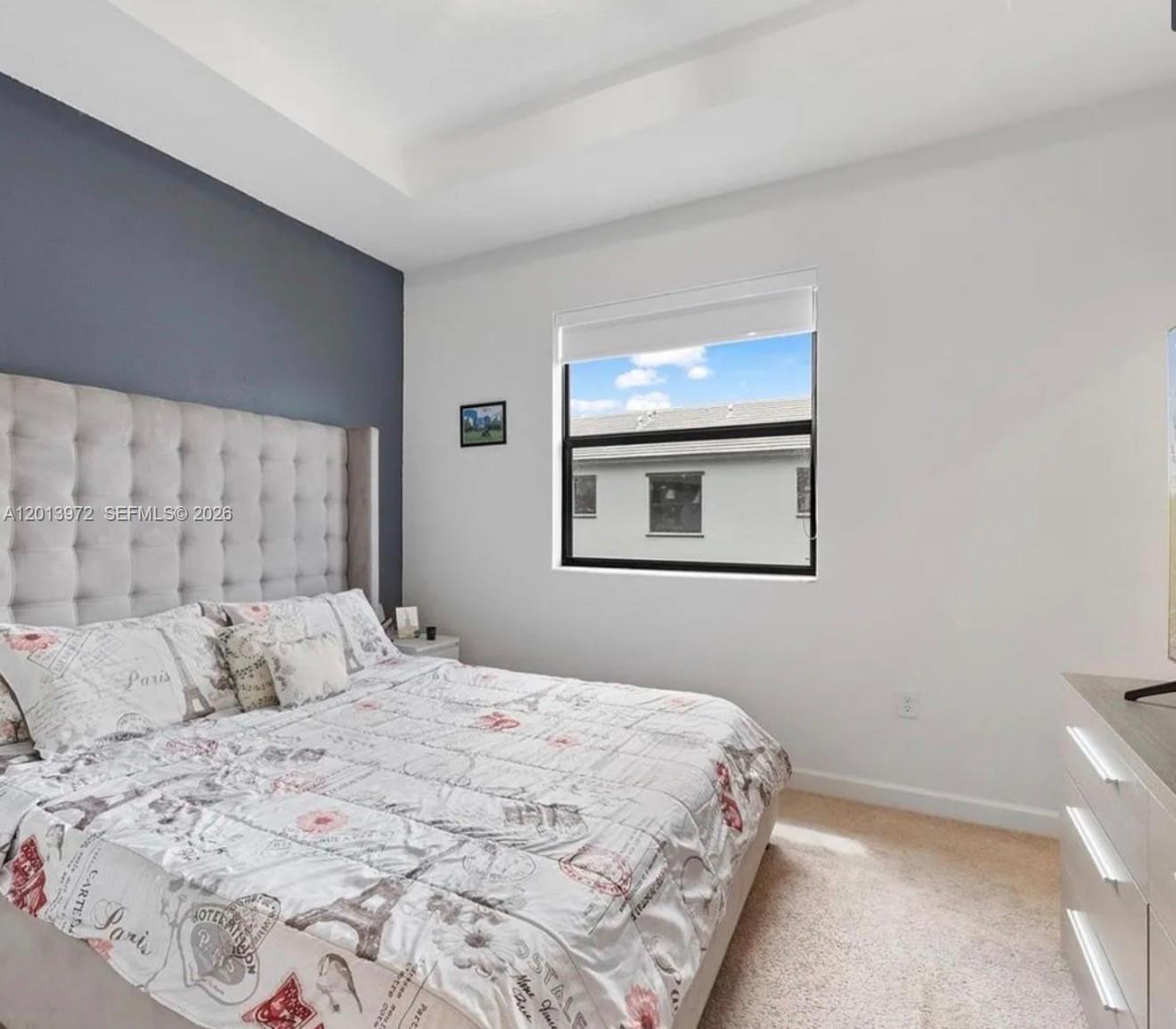 13250 Southwest 285th Street Homestead, FL 33033 - Photo 7 of 13 a bedroom with a bed and a window
