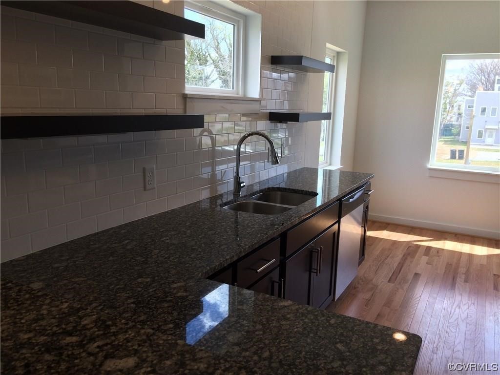 1104 Perry Street Richmond, VA 23224 - Photo 5 of 11 a view of a kitchen with a sink and cabinets