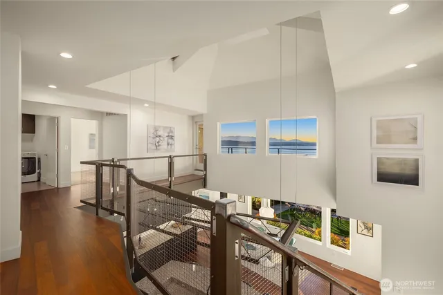 a view of a livingroom with furniture and a flat screen tv