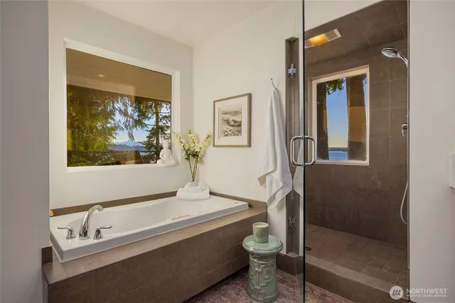 a bathroom with a sink mirror vanity and toilet