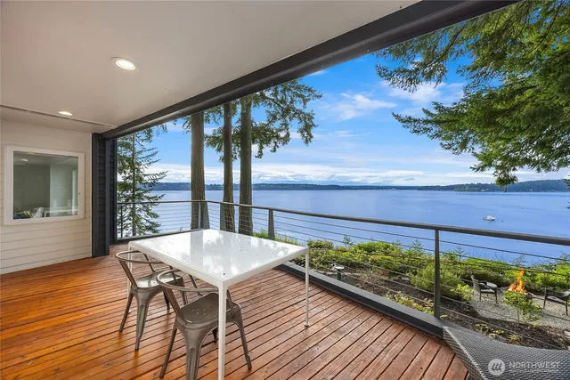 a view of a balcony with chairs