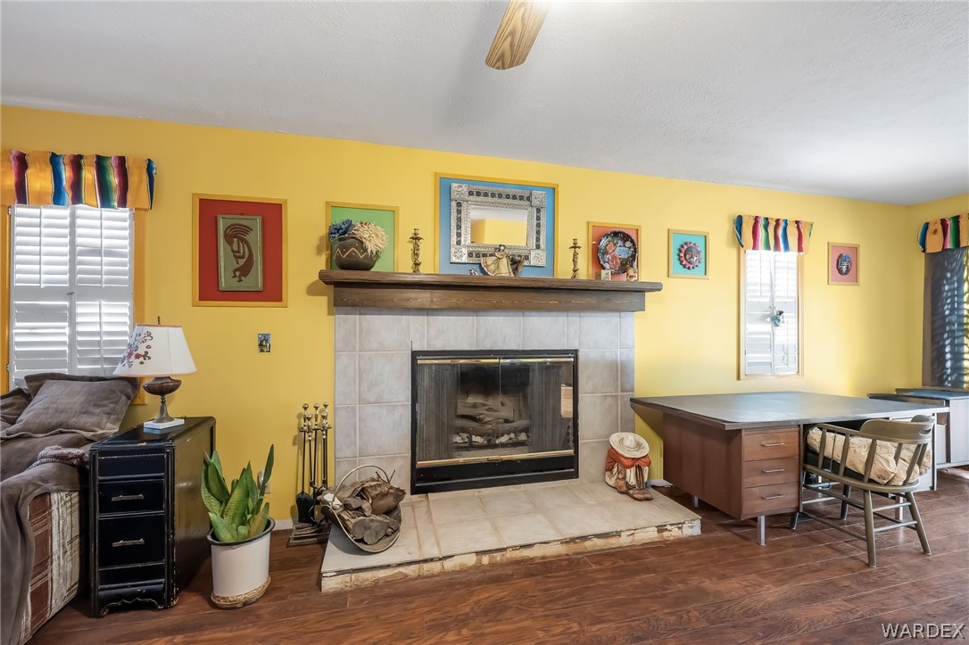 2401 North Stephan Road Kingman, AZ 86401 - Photo 52 of 92 a living room with furniture and a fireplace