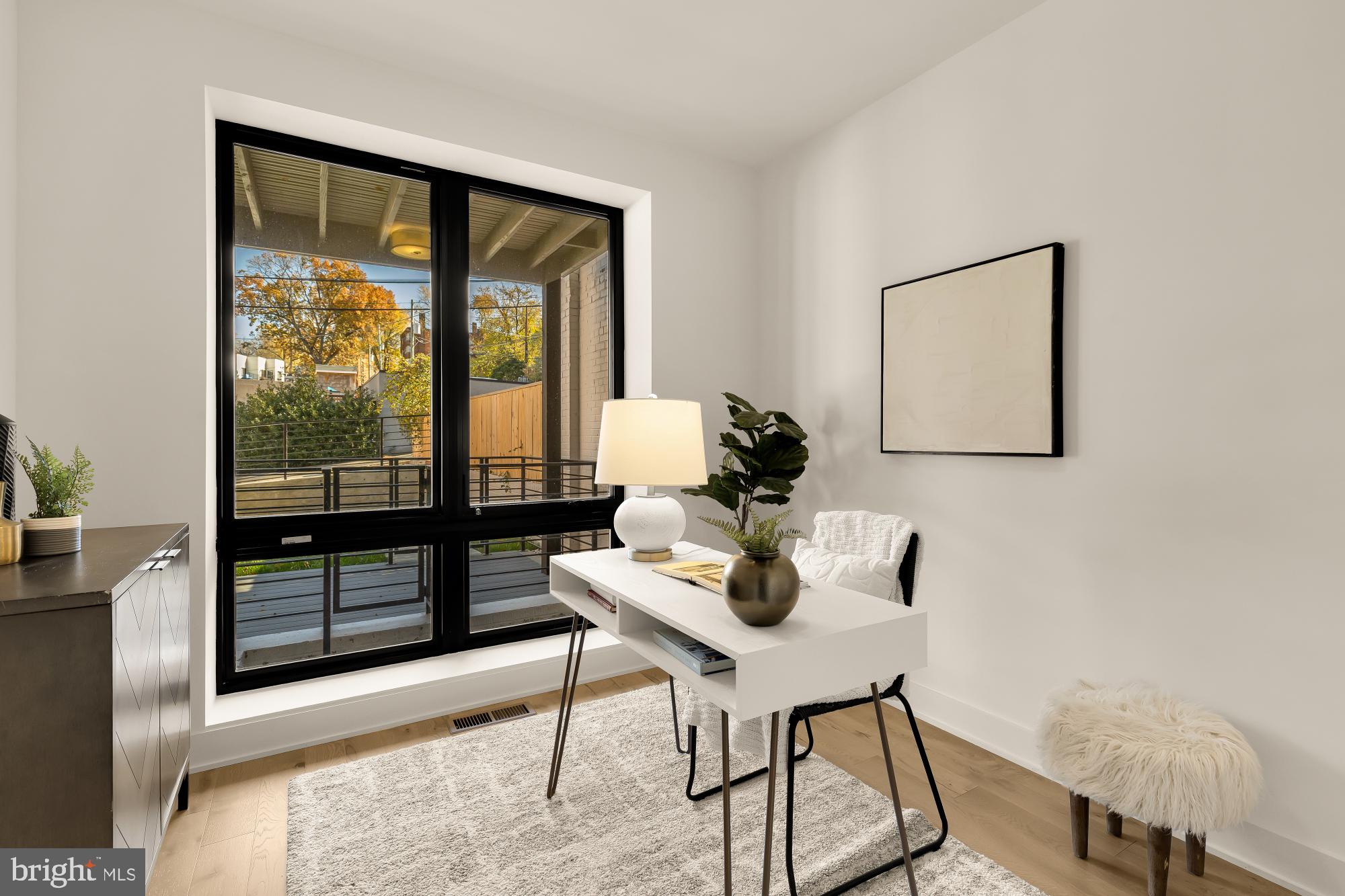 2647 41st Street Northwest, Unit 2 Washington, DC 20007 - Photo 11 of 31 a dining room with furniture and window