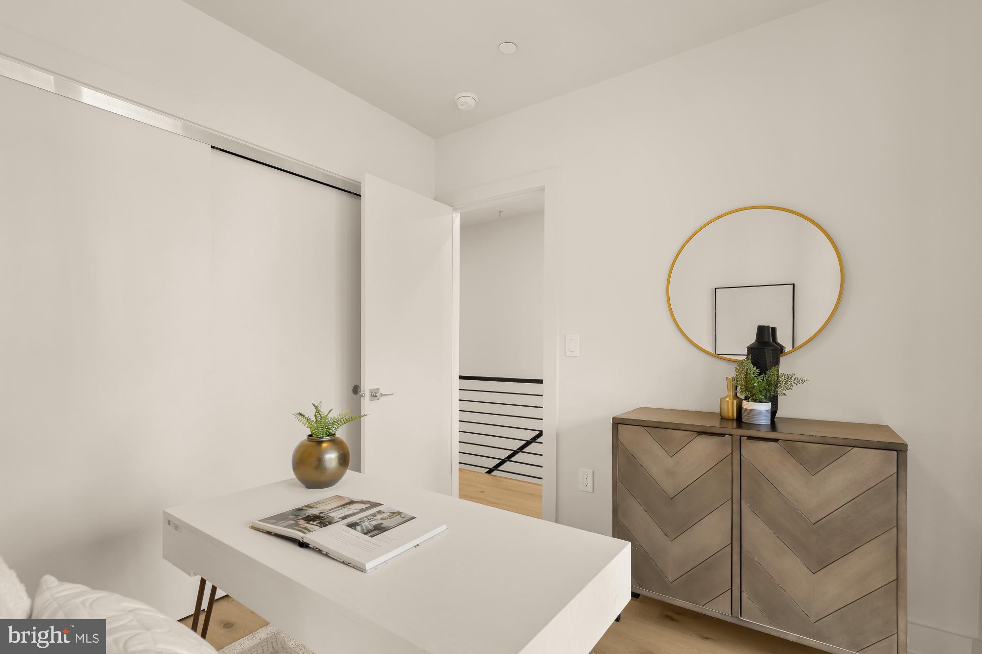 2647 41st Street Northwest, Unit 2 Washington, DC 20007 - Photo 12 of 31 a living room with table