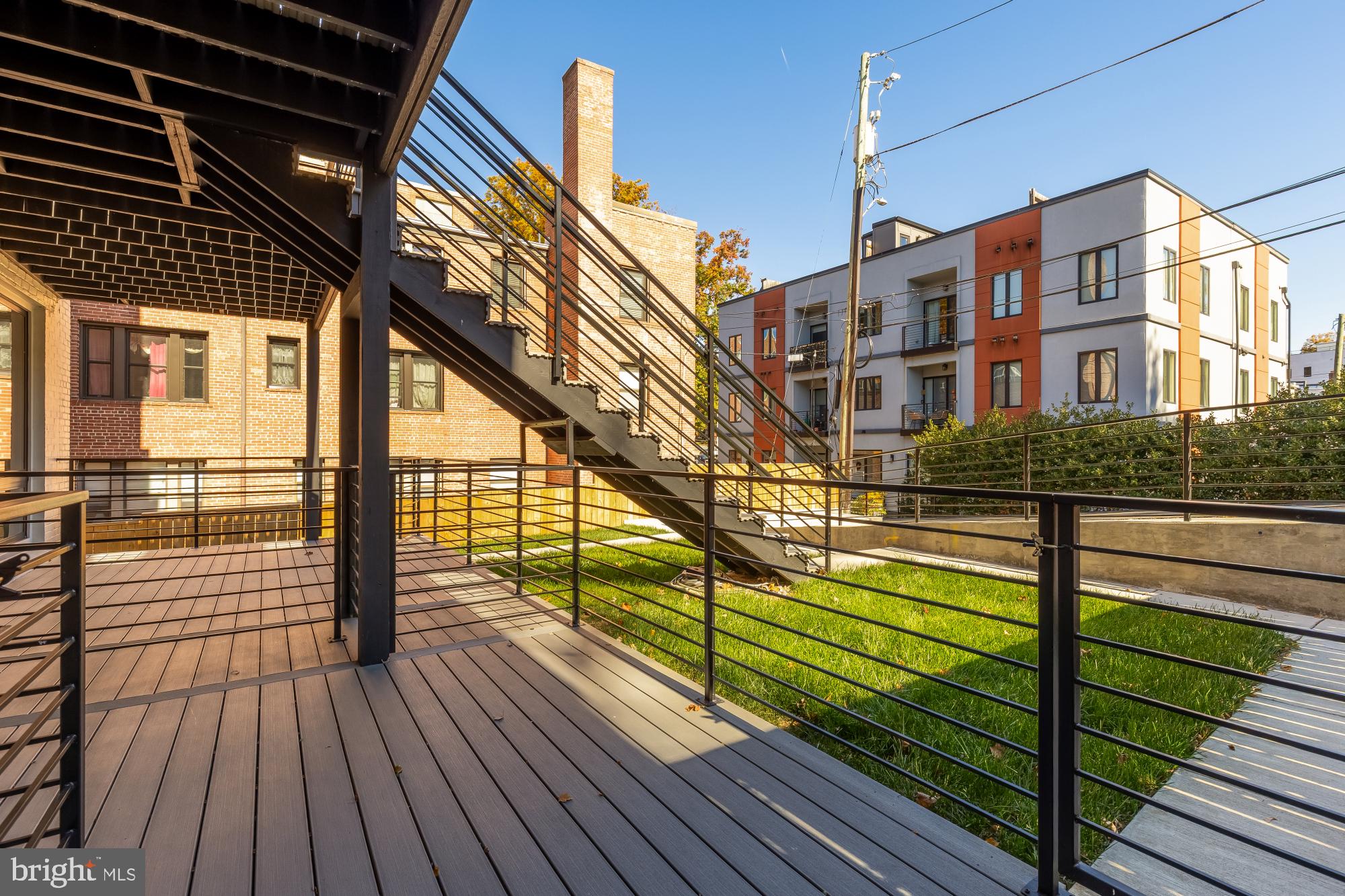 2647 41st Street Northwest, Unit 2 Washington, DC 20007 - Photo 14 of 31 a view of a balcony with wooden floor