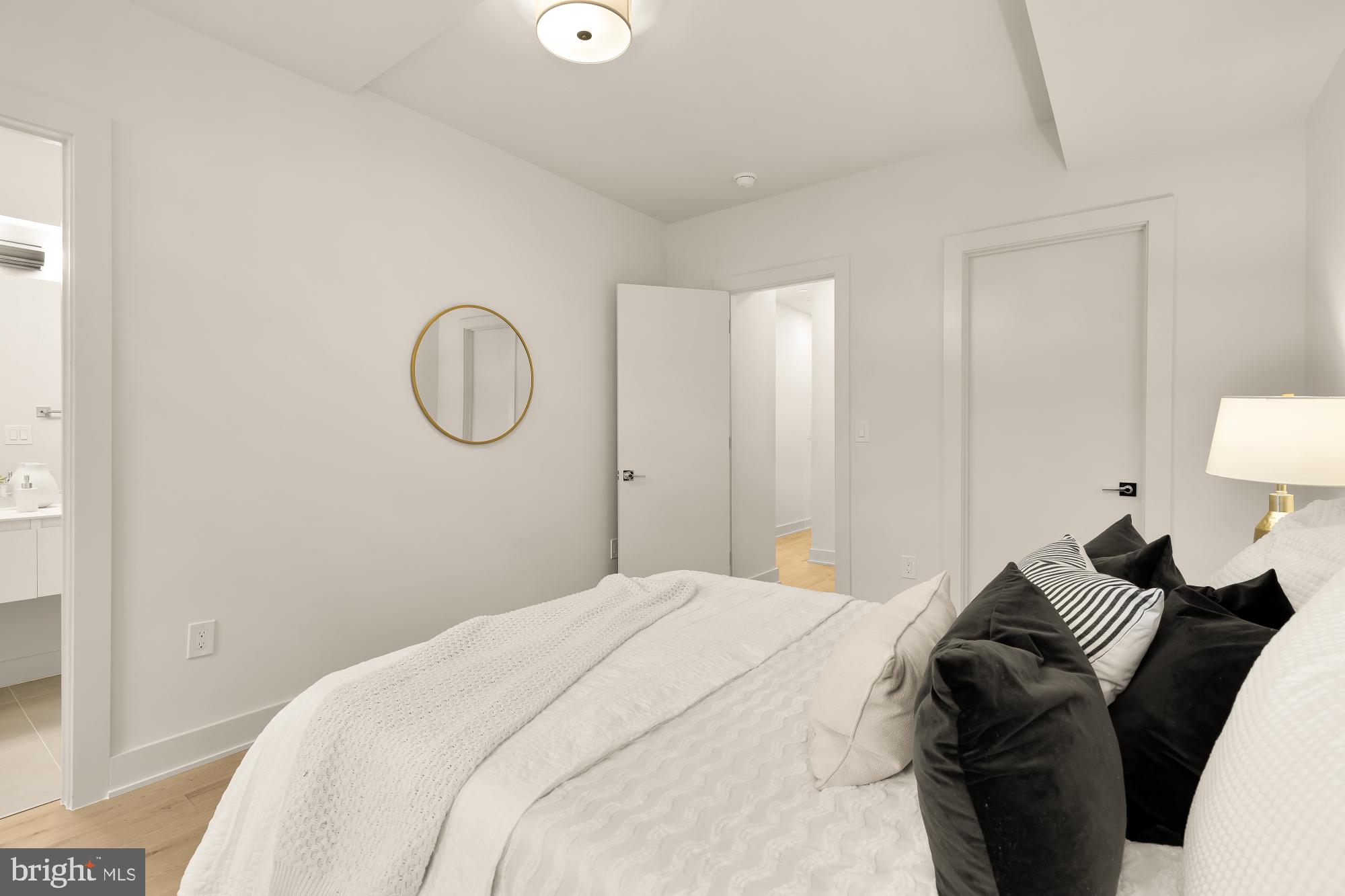 2647 41st Street Northwest, Unit 2 Washington, DC 20007 - Photo 17 of 31 a bedroom with a bed and a closet