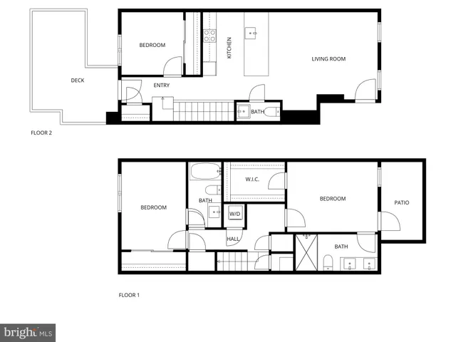 a front view of a residential apartment building with a yard