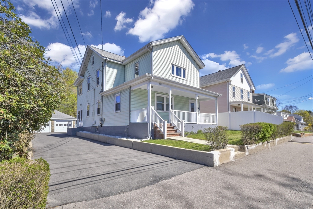 492 Metropolitan Avenue, Unit 2 Boston, MA 02136 - Photo 1 of 15 a view of house with entertaining space in front of it