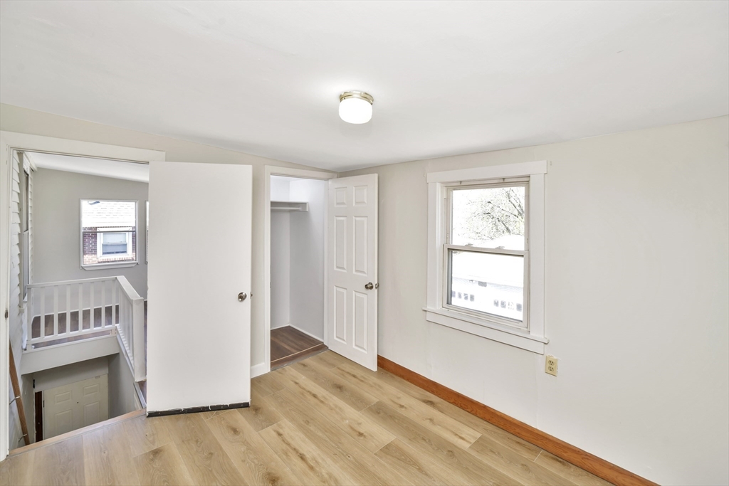 492 Metropolitan Avenue, Unit 2 Boston, MA 02136 - Photo 12 of 15 a view of livingroom with hardwood floor and hallway