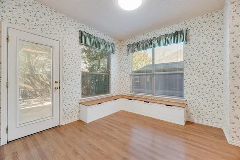 a kitchen with a stove and a microwave