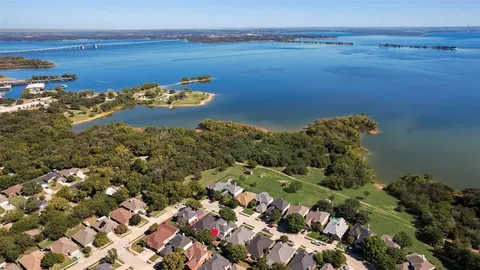 a front view of house with yard seating and green space