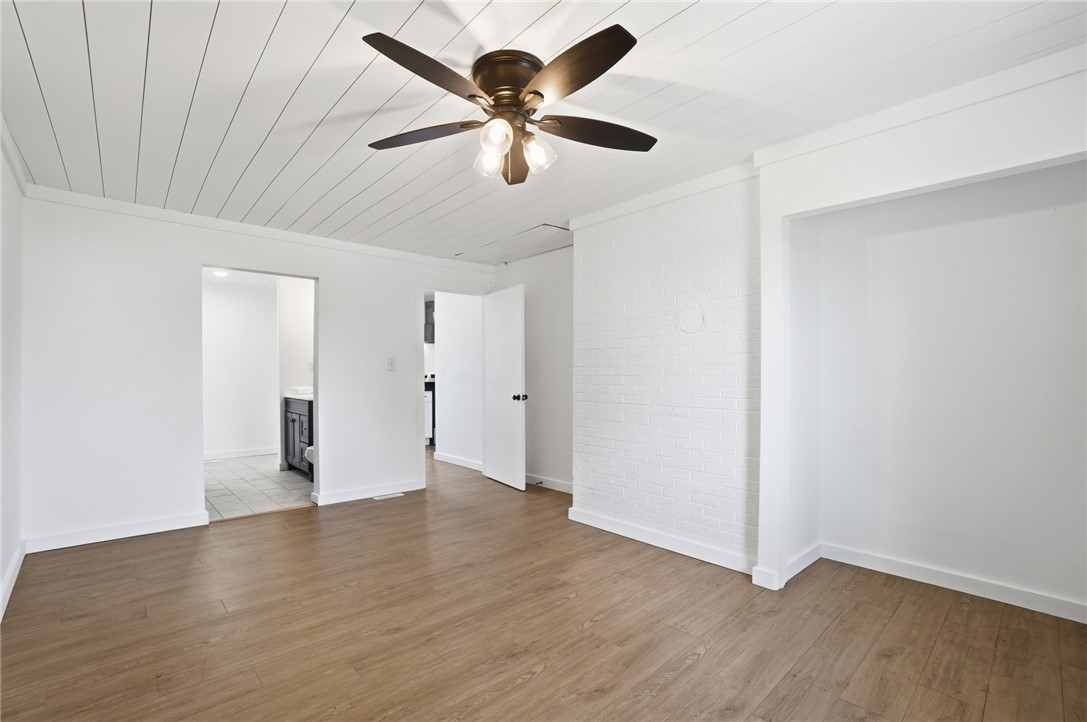 3991 Benner Road Miamisburg, OH 45342 - Photo 21 of 44 This bright room features a slatted ceiling and durable wood flooring.