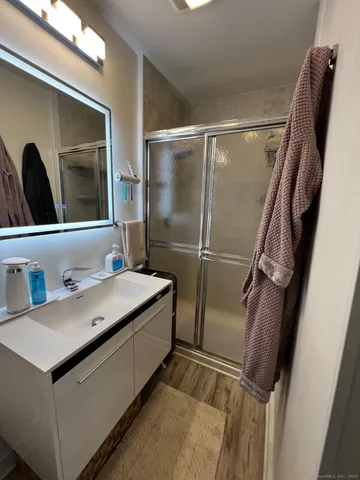 a bathroom with a sink and mirror