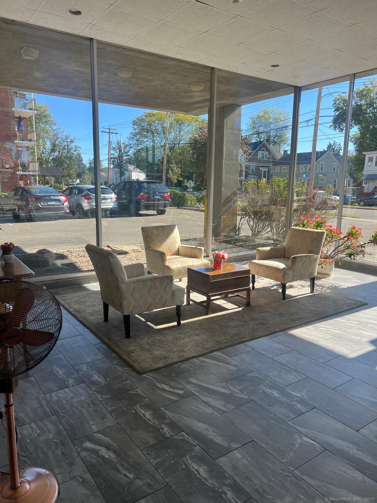 2370 North Avenue, Unit 3F Bridgeport, CT 06604 - Photo 22 of 25 a building outdoor space with patio furniture