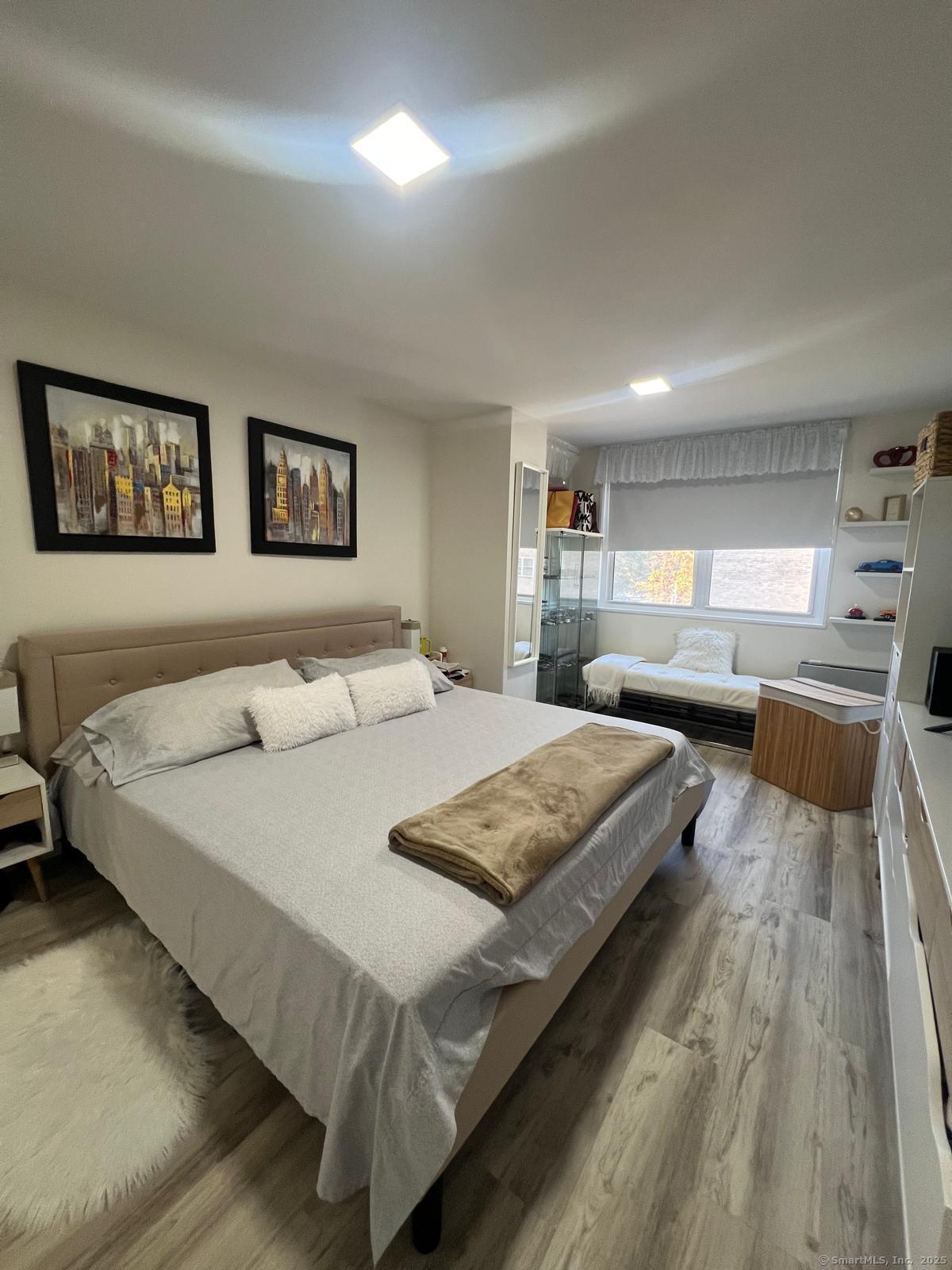 2370 North Avenue, Unit 3F Bridgeport, CT 06604 - Photo 10 of 25 a bedroom with bed and window