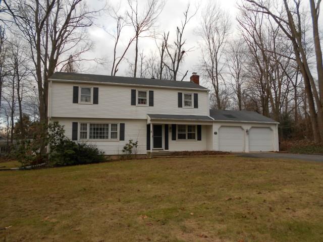 9 Fox Den Road Bethel, CT 06801 - Photo 1 of 1 a house that has a tree in front of it