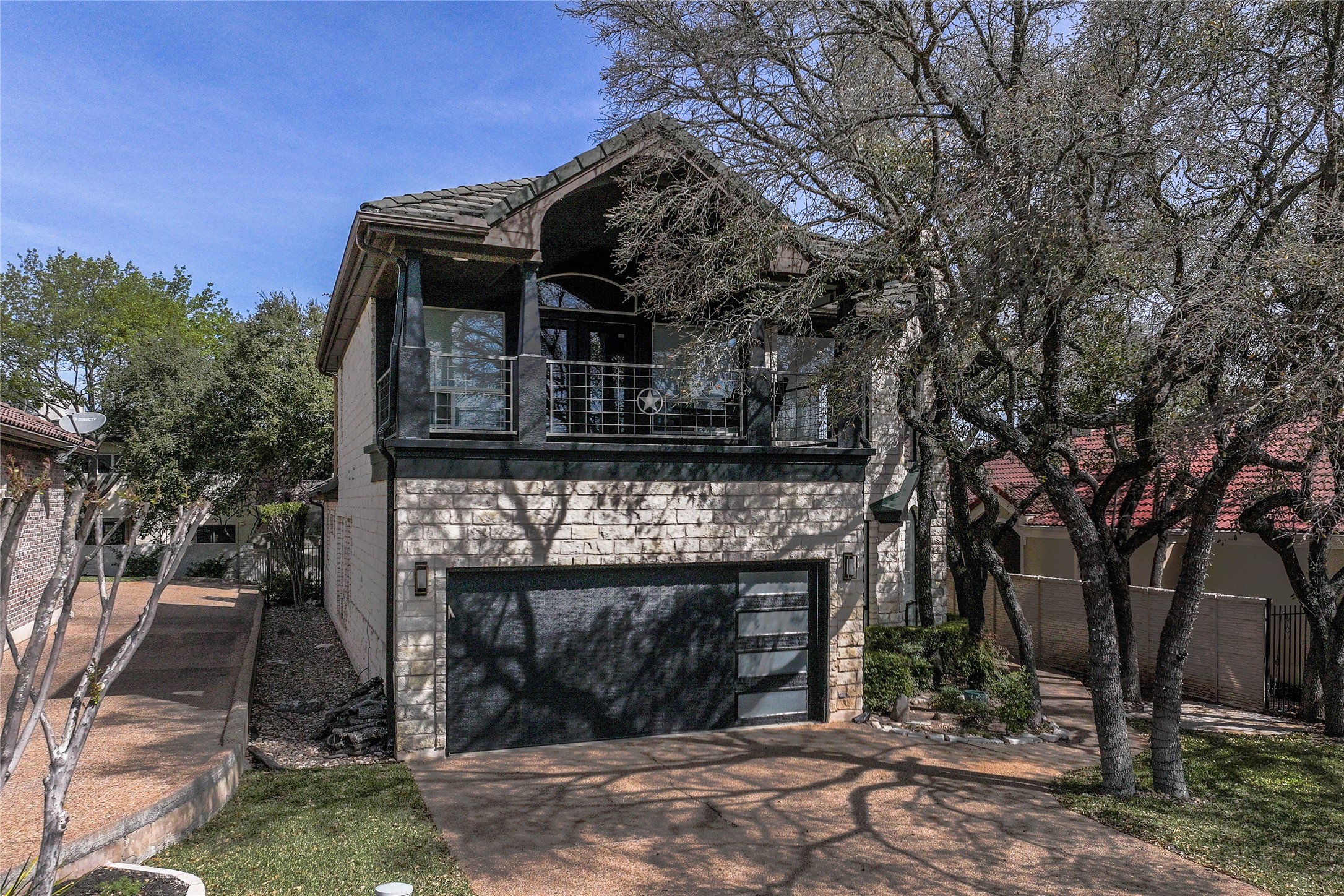 11 Treehaven Lane The Hills, TX 78738 - Photo 3 of 40 a front view of a house with a yard